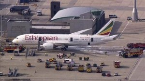 Emergency crew surrounds a Boeing 787 Dreamliner, operated by Ethiopian Airlines, which caught fire at Britain's Heathrow airport