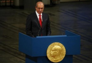 Uzumcu, director general of the OPCW delivers a speech during the Nobel Peace Prize awards ceremony at the City Hall in Oslo