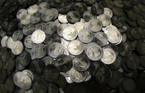 Two Euro coins are seen in the Austrian Mint headquarters in Vienna