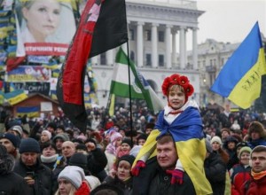 Pro-European integration protesters take part in a rally at Independence Square in Kiev