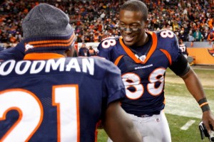 Denver Broncos' Thomas celebrates with teammate Goodman after the Broncos defeated the Pittsburgh Steelers on Thomas' touchdown during overtime in their NFL AFC wildcard playoff football game in Denver