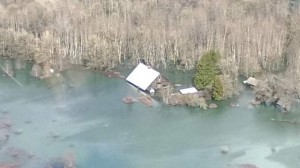 An aerial view of area affected by landslide near State Route 530 near Oso, Washington