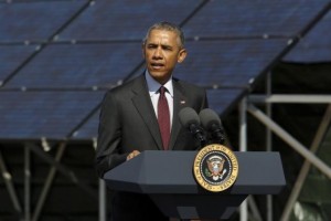 U.S. President Barack Obama delivers remarks on clean energy after a tour of a solar power array at Hill Air Force Base, Utah