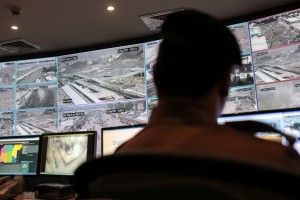 A security officer monitors Muslim pilgrims attending the annual hajj pilgrimage on CCTV screens at a security command center in Mina, Saudi Arabia, in Friday, Sept. 25 2015, a day after a stampede killed more than 700 people. Saudi authorities are investigating what sparked Thursday's disaster in Mina, about 5 kilometers (3 miles) from Mecca. Initial reports suggested two crowds coming from opposing directions converged on an intersection, which began pushing and shoving until a stampede began. (AP Photo/Mosa'ab Elshamy)