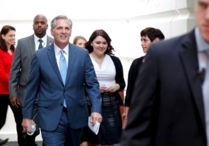U.S. House Majority Leader Kevin McCarthy (R-CA) (3rd L) arrives with staff members for a Republican caucus candidates' forum for the next House speaker, at the U.S. Capitol in Washington October 8, 2015. REUTERS/Jonathan Ernst
