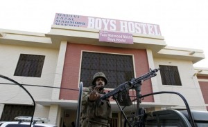 A soldier stands guard at the entrance to a dormitory where a militant attack took place, in Bacha Khan University in Charsadda, Pakistan January 20, 2016. REUTERS/Caren Firouz