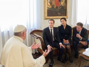 Pope Francis talks to Facebook CEO Mark Zuckerberg (2nd L) and his wife Priscilla Chan during a meeting at the Vatican August 29, 2016. Osservatore Romano/Handout via Reuters ATTENTION EDITORS - THIS IMAGE WAS PROVIDED BY A THIRD PARTY. EDITORIAL USE ONLY. NO RESALES. NO ARCHIVE. - RTX2NGG6